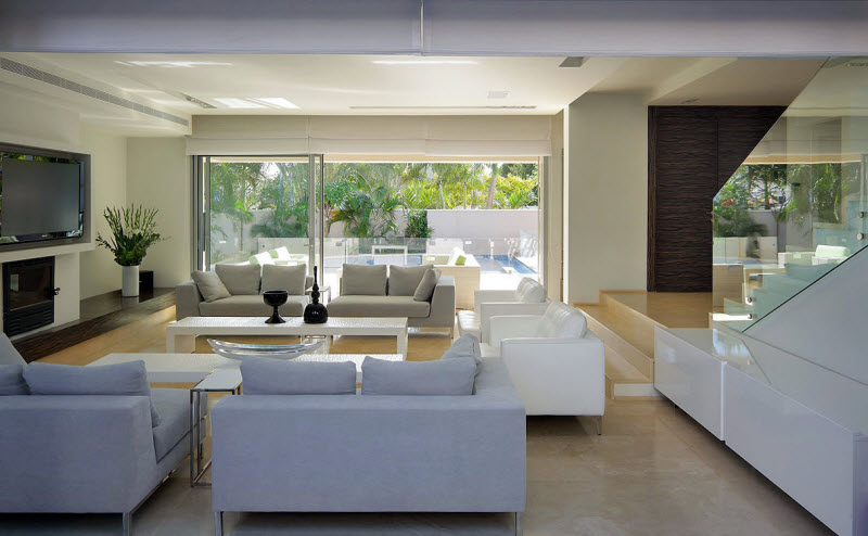 open Living room with grey and white sofas