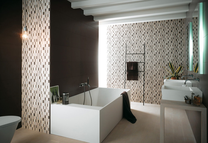 Designer Tiles in Bathroom with white bathtub