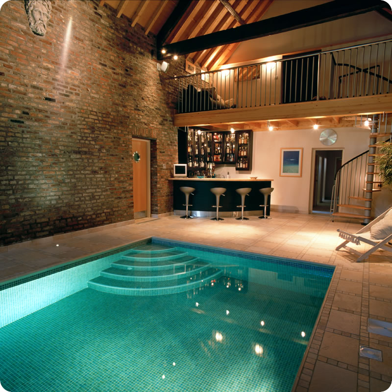Indoor swimming pool with bar